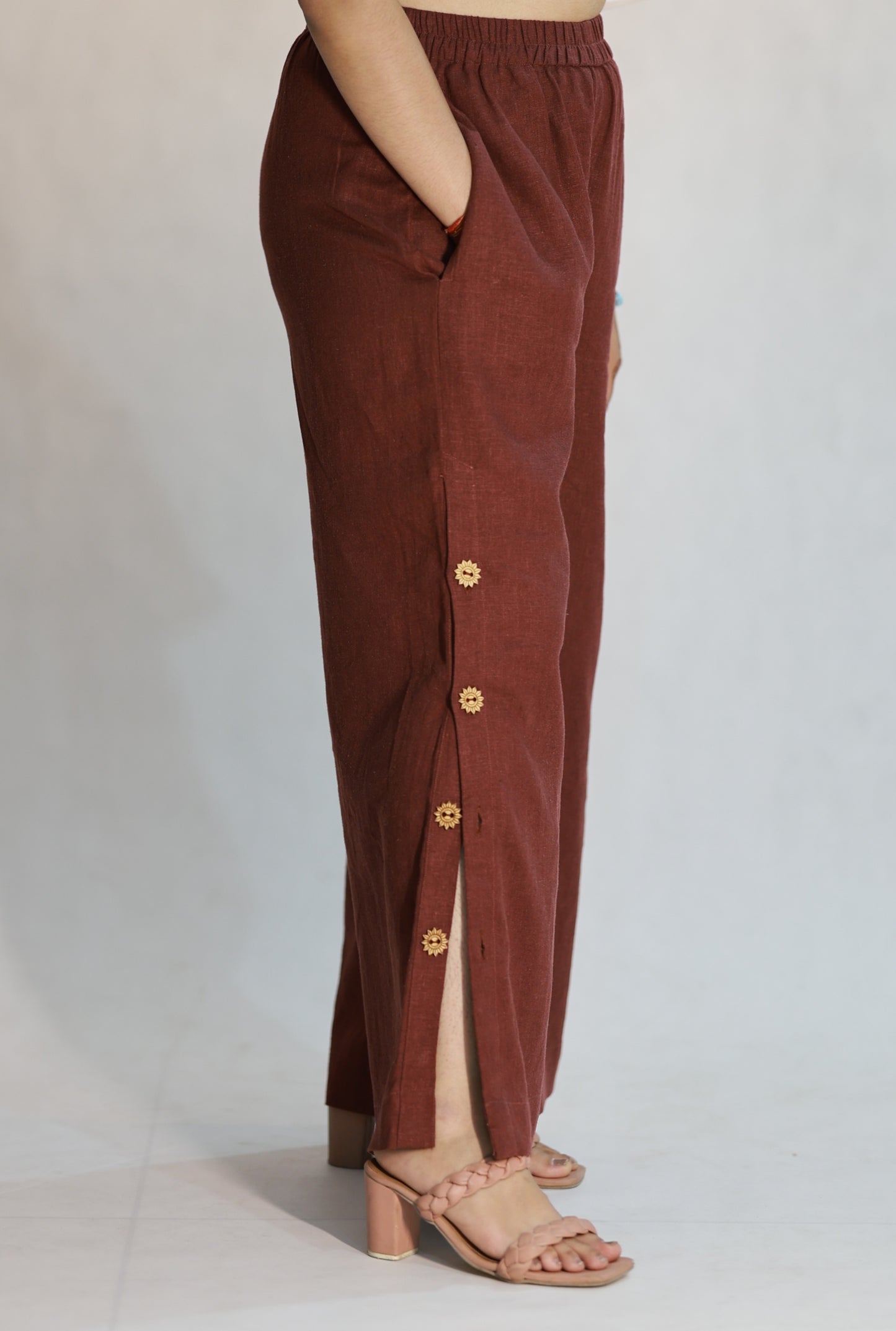 FLARED PANTS WITH FUNCTIONAL SIDE SLIT