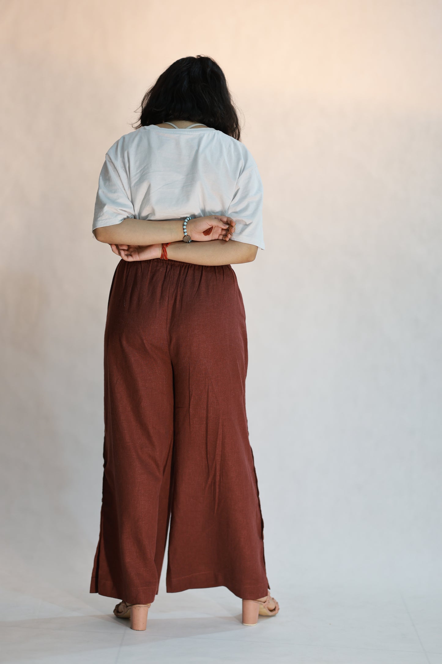 FLARED PANTS WITH FUNCTIONAL SIDE SLIT